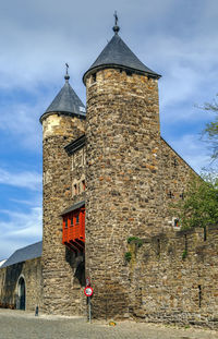 Low angle view of old building against sky