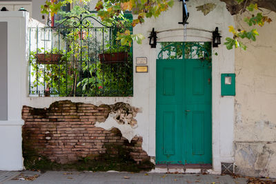 Brick wall with closed door