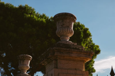 Low angle view of statue against sky