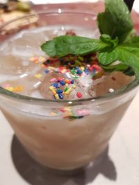 Close-up of ice cream in glass on table