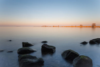 Scenic view of sea against clear sky