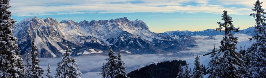 Scenic view of snowcapped mountains against sky