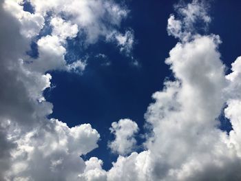 Low angle view of clouds in blue sky