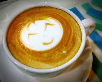 Close-up of cappuccino on table