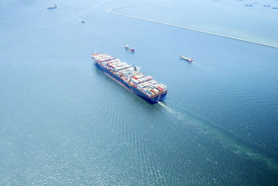 High angle view of container ship in sea