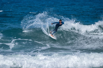 Man surfing in sea