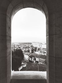 View of cityscape seen through arch