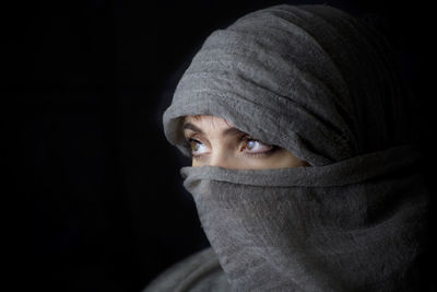 Close-up portrait of a serious young woman