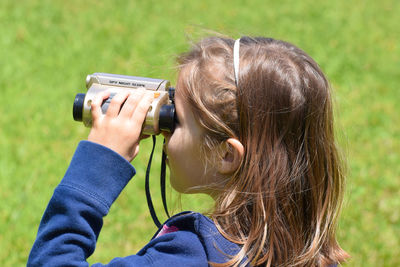 Portrait of woman photographing