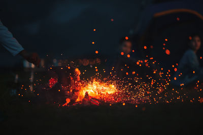 Close-up of illuminated fire crackers at night