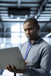 Young man using laptop