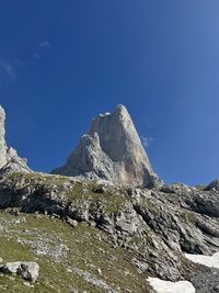 Scenic view of mountain against blue sky. picos de europa