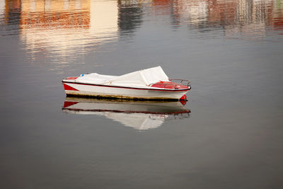 Boat moored in lake