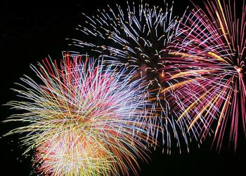 Fireworks exploding in night sky