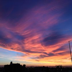 Scenic view of dramatic sky at sunset