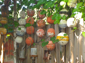 Low angle view of illuminated lanterns hanging at market stall