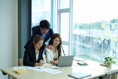 Business colleagues working at office