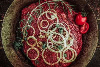 High angle view of meat with vegetables in bowl