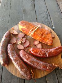 High angle view of home made smoked sausage on table