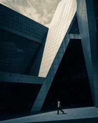 Man walking on modern office building