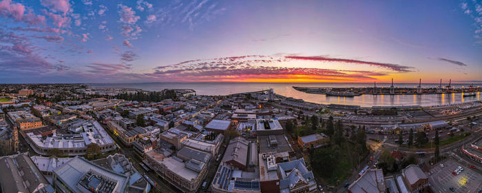 High angle view of townscape against sky during sunset