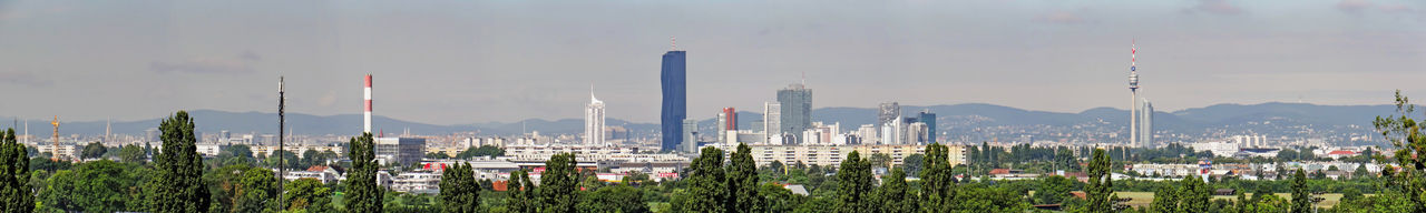 Panoramic view of city against sky