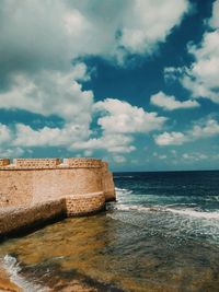 View of fort against sea and sky