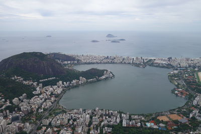 High angle view of city by sea