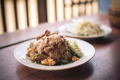 Close-up of food in plate on table