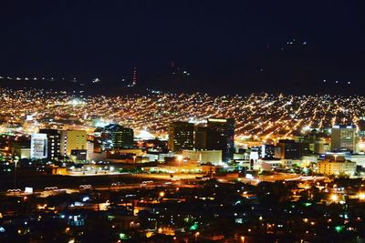 Illuminated cityscape at night