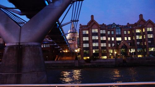 Illuminated buildings in city at night