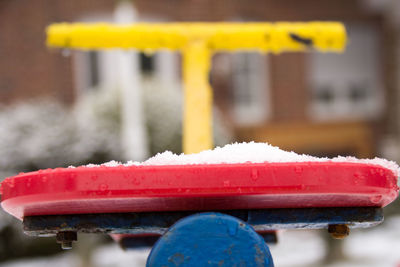 Close-up of yellow container