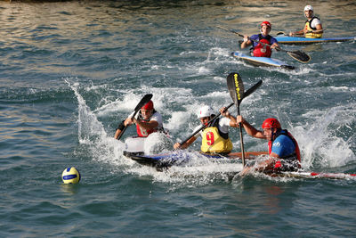 People enjoying in sea