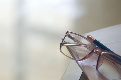 Close-up of eyeglasses on table