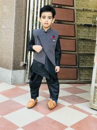 Portrait of boy wearing traditional clothing