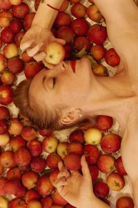 Close-up of hand holding apples