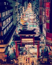 High angle view of people at illuminated building