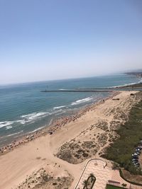 Scenic view of beach against clear sky