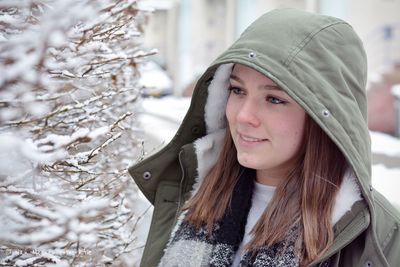 Close-up of woman in warm clothing during winter
