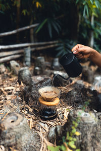 Close-up of hand holding drink