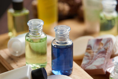 Close-up of glass bottles on table