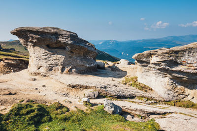 Scenic view of rock formation against sky