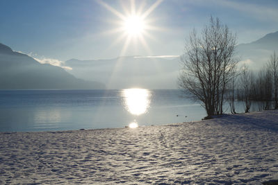 Scenic view of sea against sky during winter