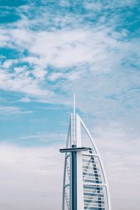 Low angle view of bridge on building against sky