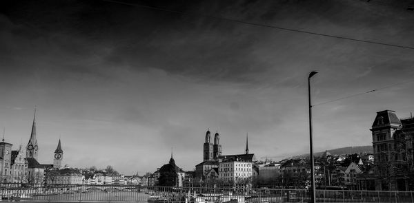 Panoramic view of buildings in city against sky