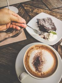 High angle view of coffee cup on table