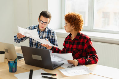 Business colleagues working at office