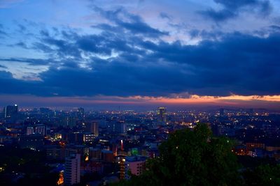 High angle view of illuminated buildings against sky