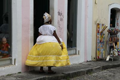 Rear view of woman on street