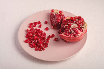 High angle view of strawberries in plate on table